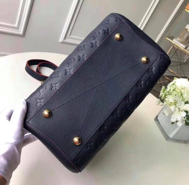 LV Montaigne MM Monogram Empreinte Leather Handle Shoulder Bag with Navy Blue Leather Trim and Shoulder Strap