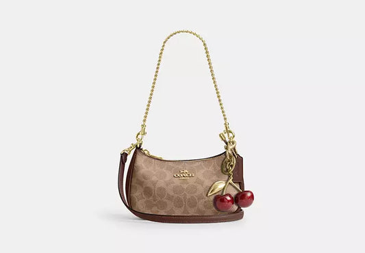 Teri Mini Crossbody Bag In Signature Canvas